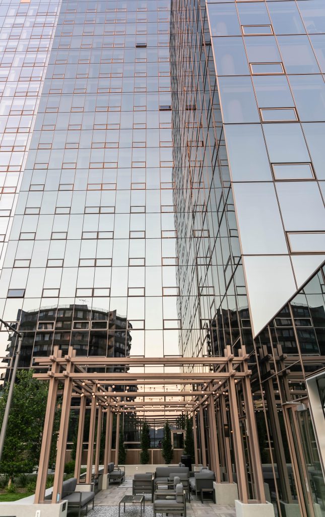 Rooftop pergola seating at twilight.