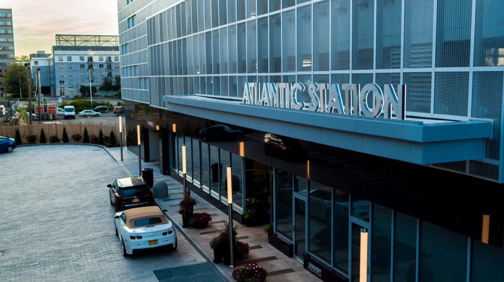 Twilight view of building entrance.
