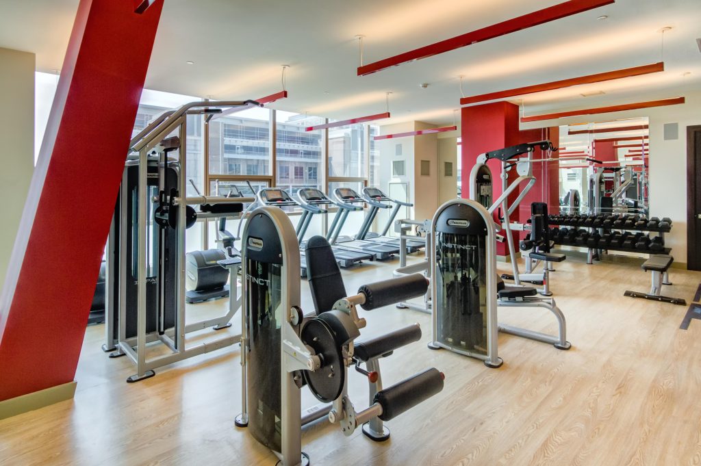Fitness center with weight machines.