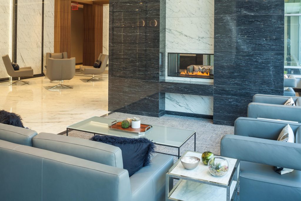 Lobby fireplace with lounge seating.